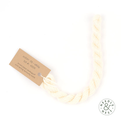 Silk & Ivory White Thread on a White Background