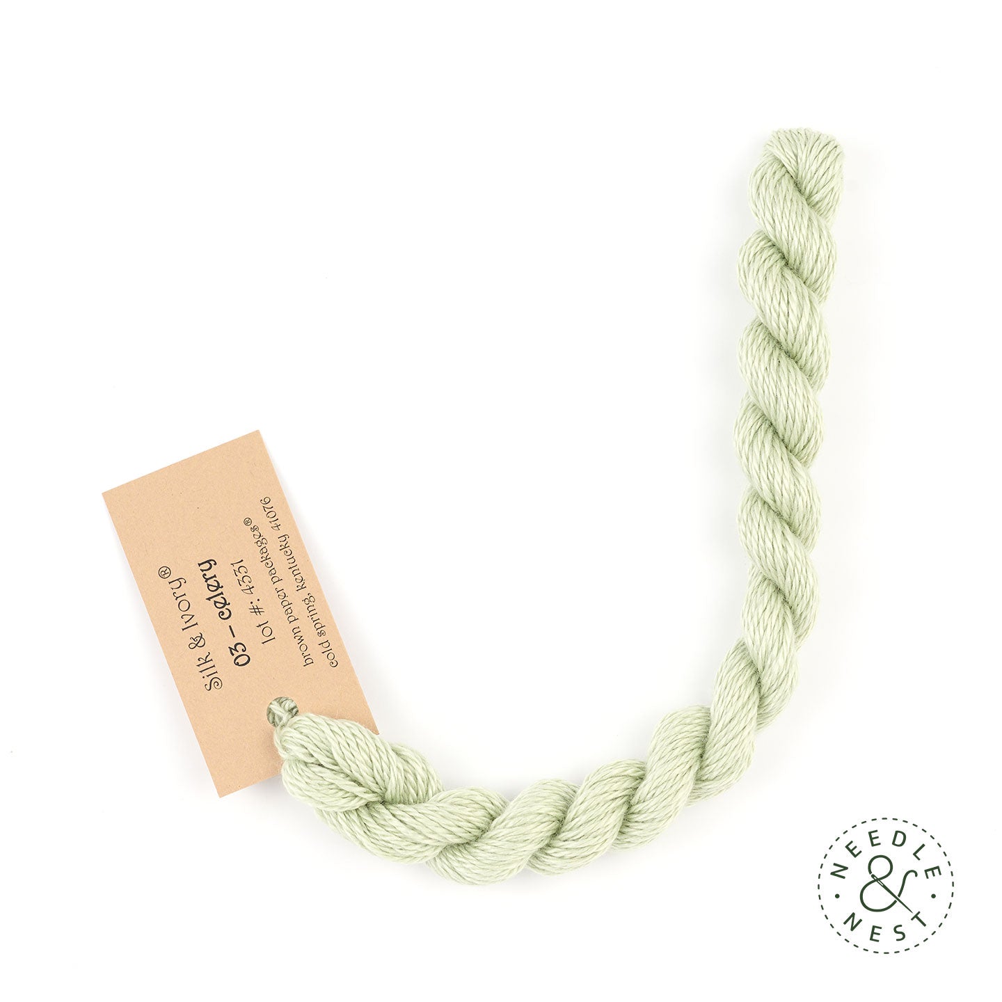 Silk & Ivory Celery Thread on a White Background