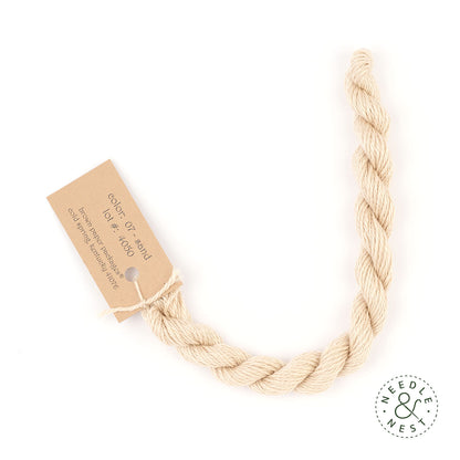 Silk & Ivory Sand Thread on a White Background