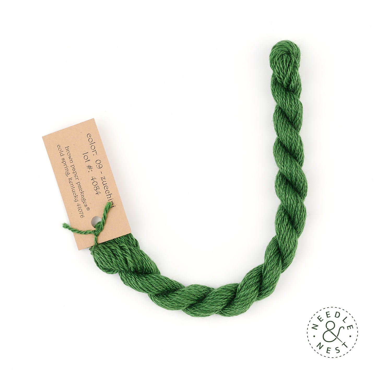 Silk & Ivory Zucchini Thread on a White Background