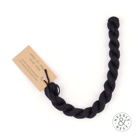 Silk & Ivory Black Thread on a White Background