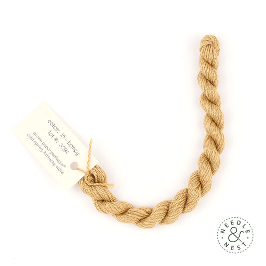Silk & Ivory Honey Thread on a White Background