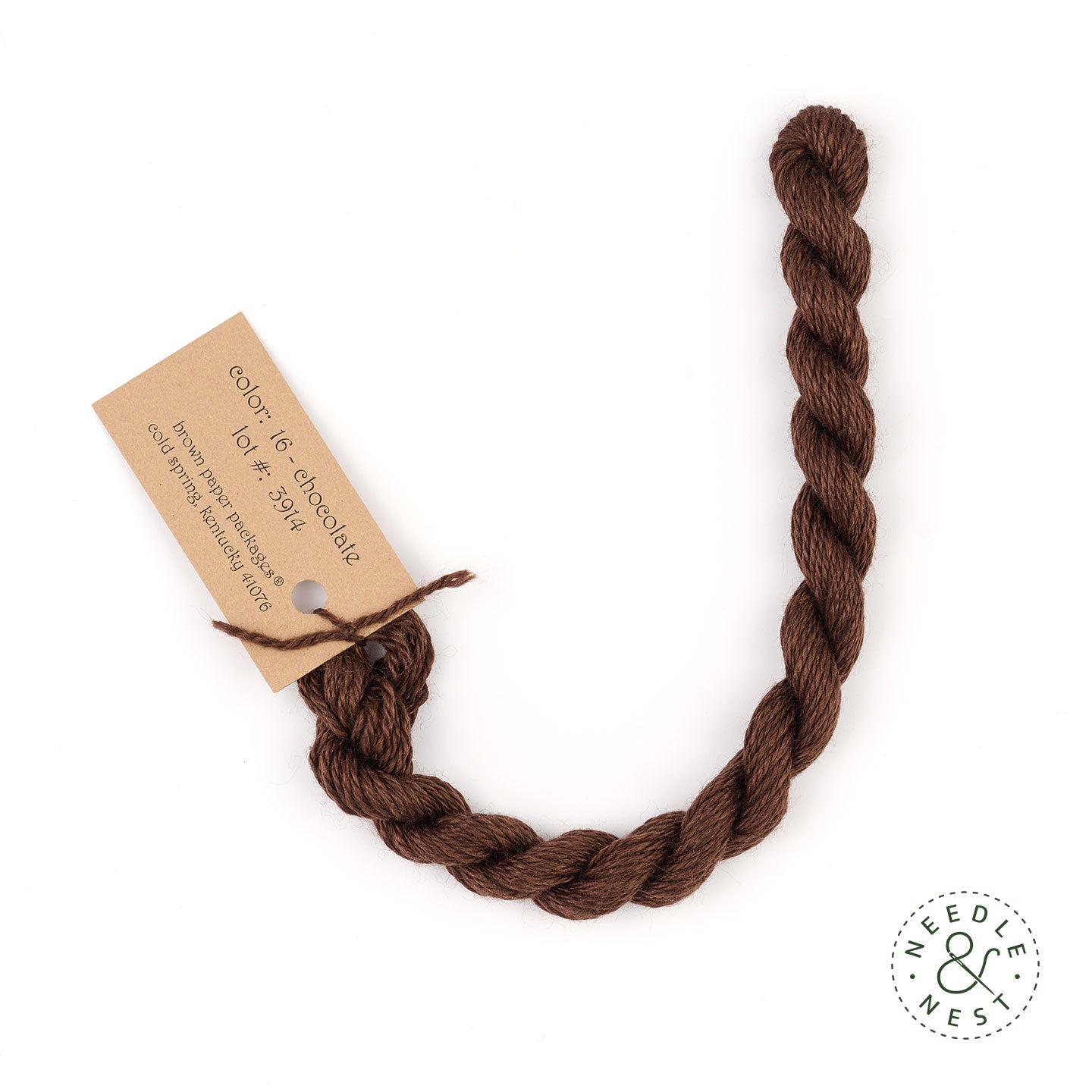 Silk & Ivory Chocolate Thread on a White Background