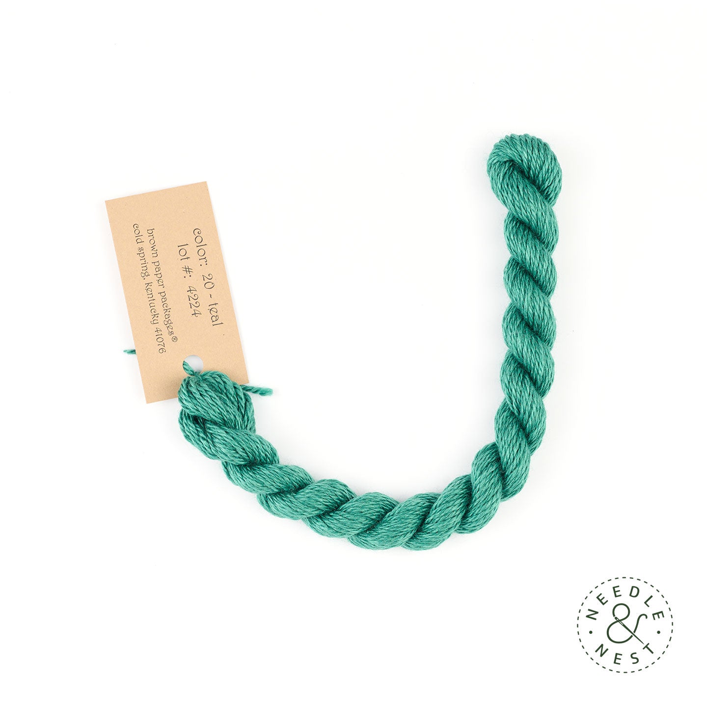 Silk & Ivory Teal Thread on a White Background