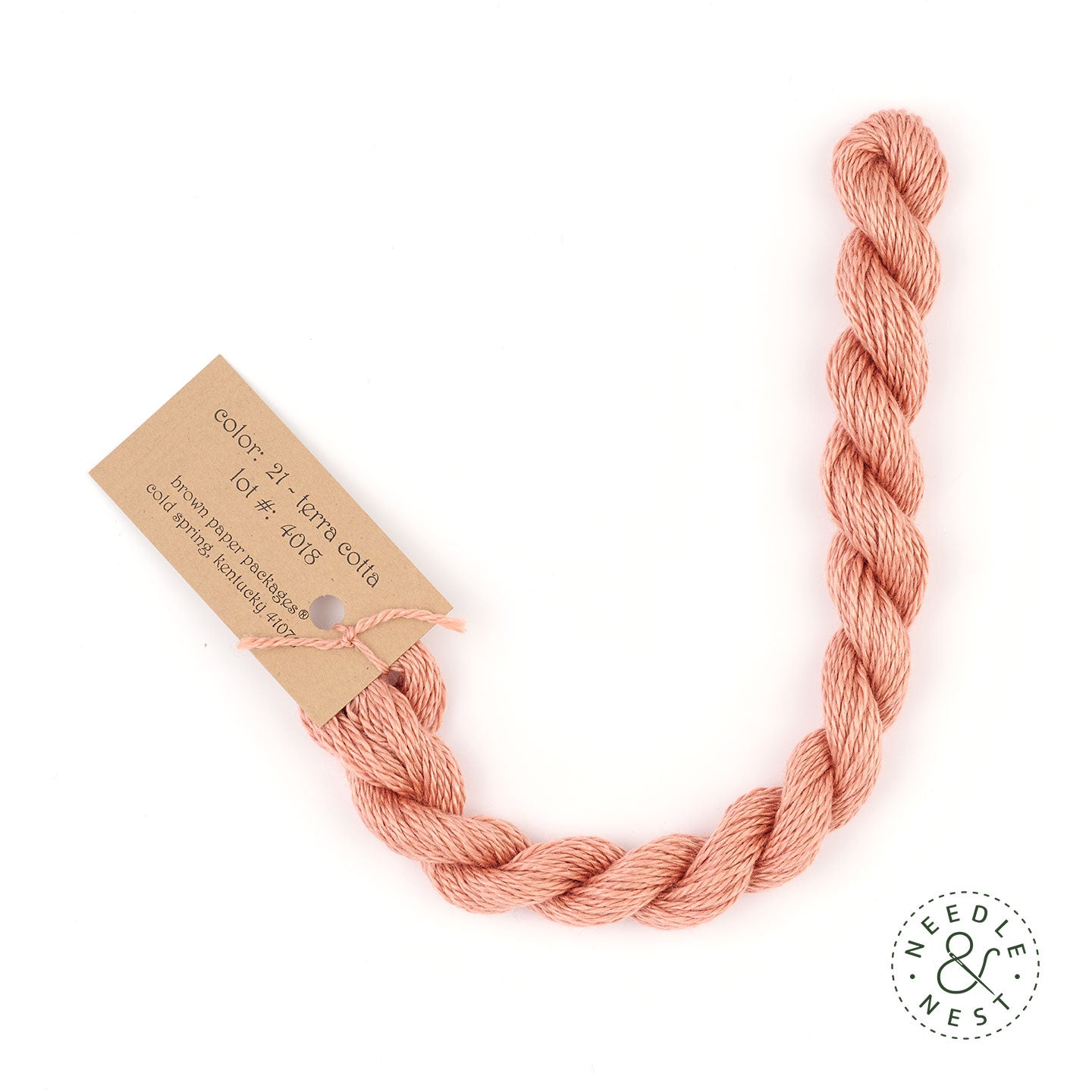 Silk & Ivory Terra Cotta Thread on a White Background