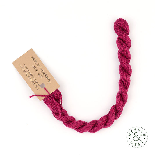 Silk & Ivory Raspberry Thread on a White Background