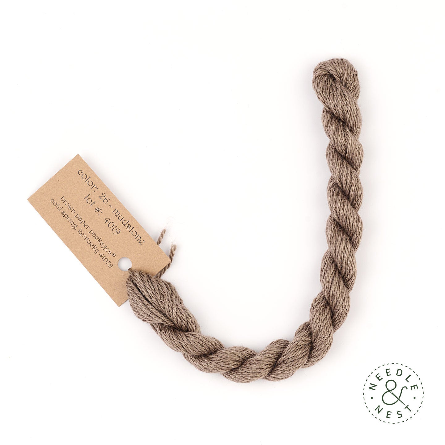 Silk & Ivory Mudstone Thread on a White Background