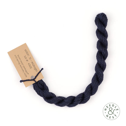 Silk & Ivory Midnight Thread on a White Background