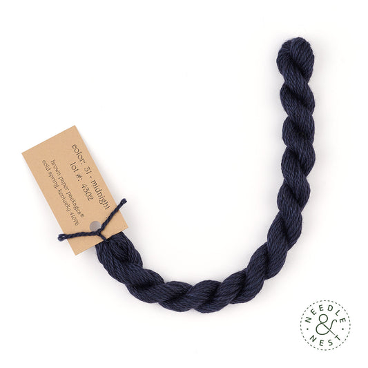 Silk & Ivory Midnight Thread on a White Background