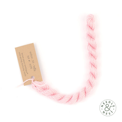 Silk & Ivory Taffy Thread on a White Background