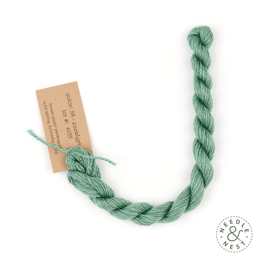 Silk & Ivory Eucalyptus Thread on a White Background