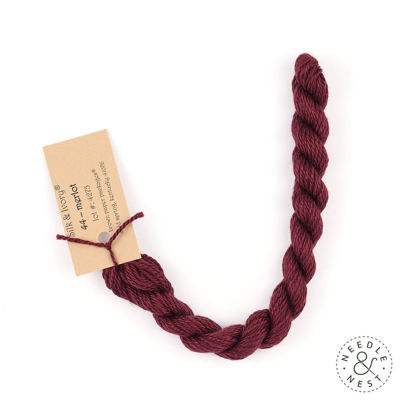 Silk & Ivory Merlot Thread on a White Background
