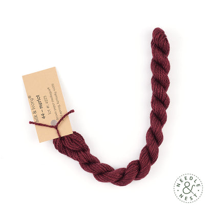 Silk & Ivory Merlot Thread on a White Background