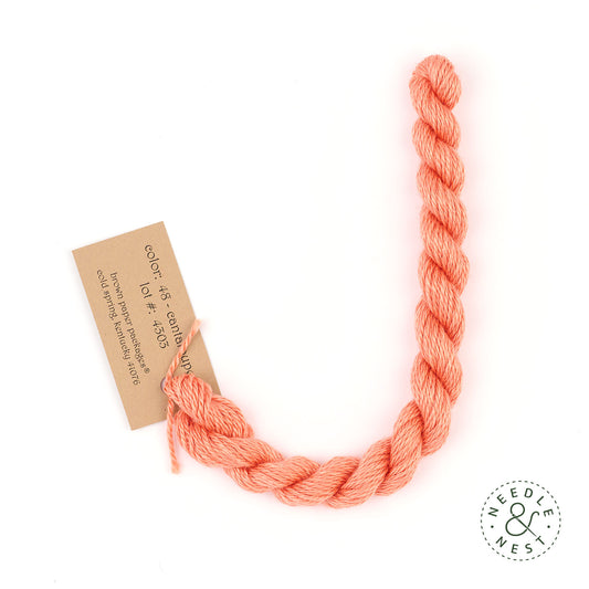 Silk & Ivory Cantaloupe Thread on a White Background