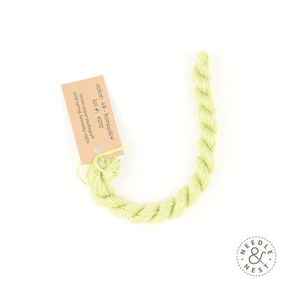 Silk & Ivory Honeydew Thread on a White Background