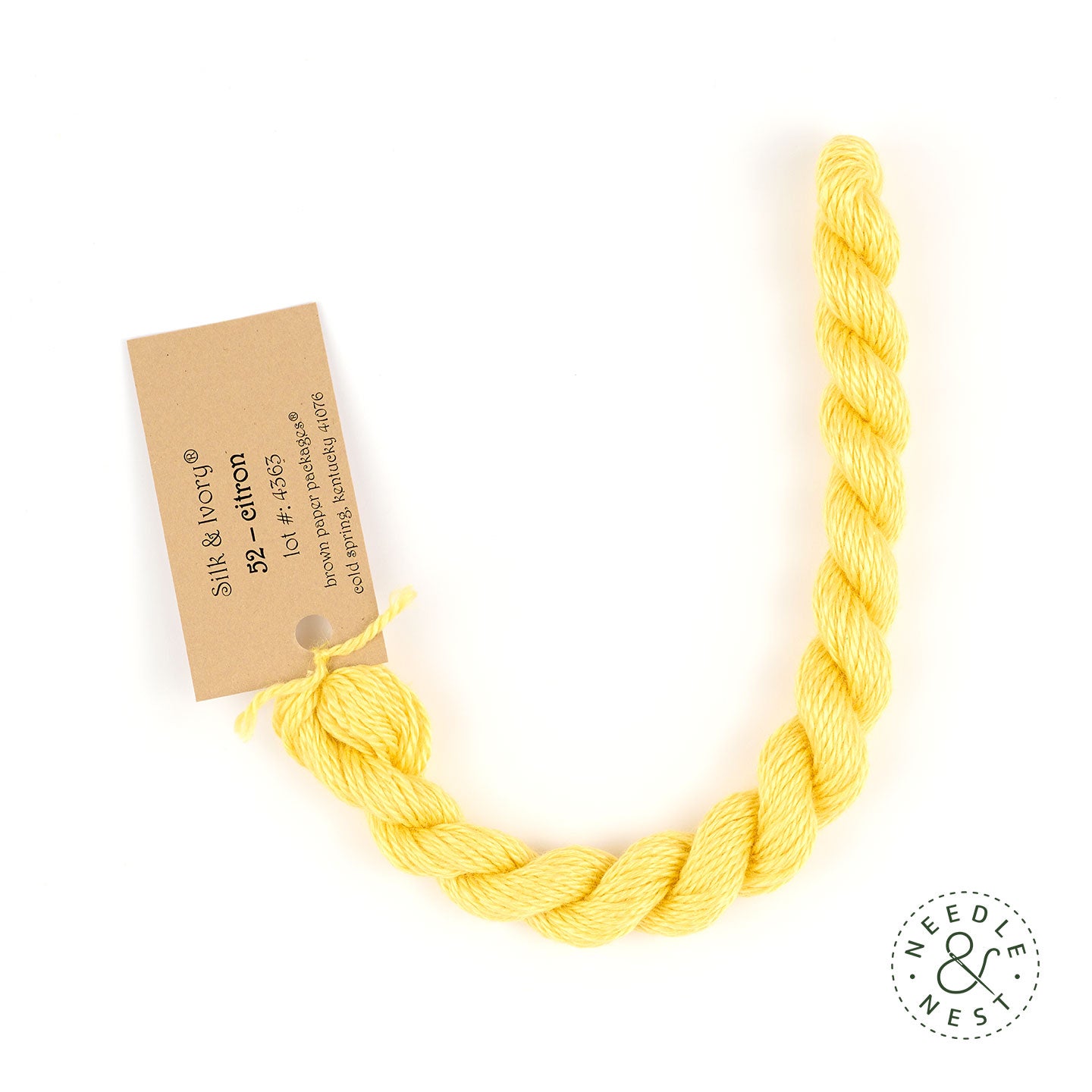 Silk & Ivory Citron Thread on a White Background