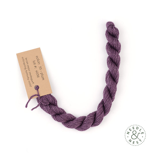 Silk & Ivory Plum Thread on a White Background