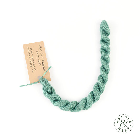 Silk & Ivory Bluegrass Thread on a White Background