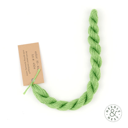 Silk & Ivory Kiwi Thread on a White Background