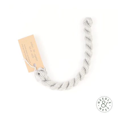 Silk & Ivory Oyster Thread on a White Background