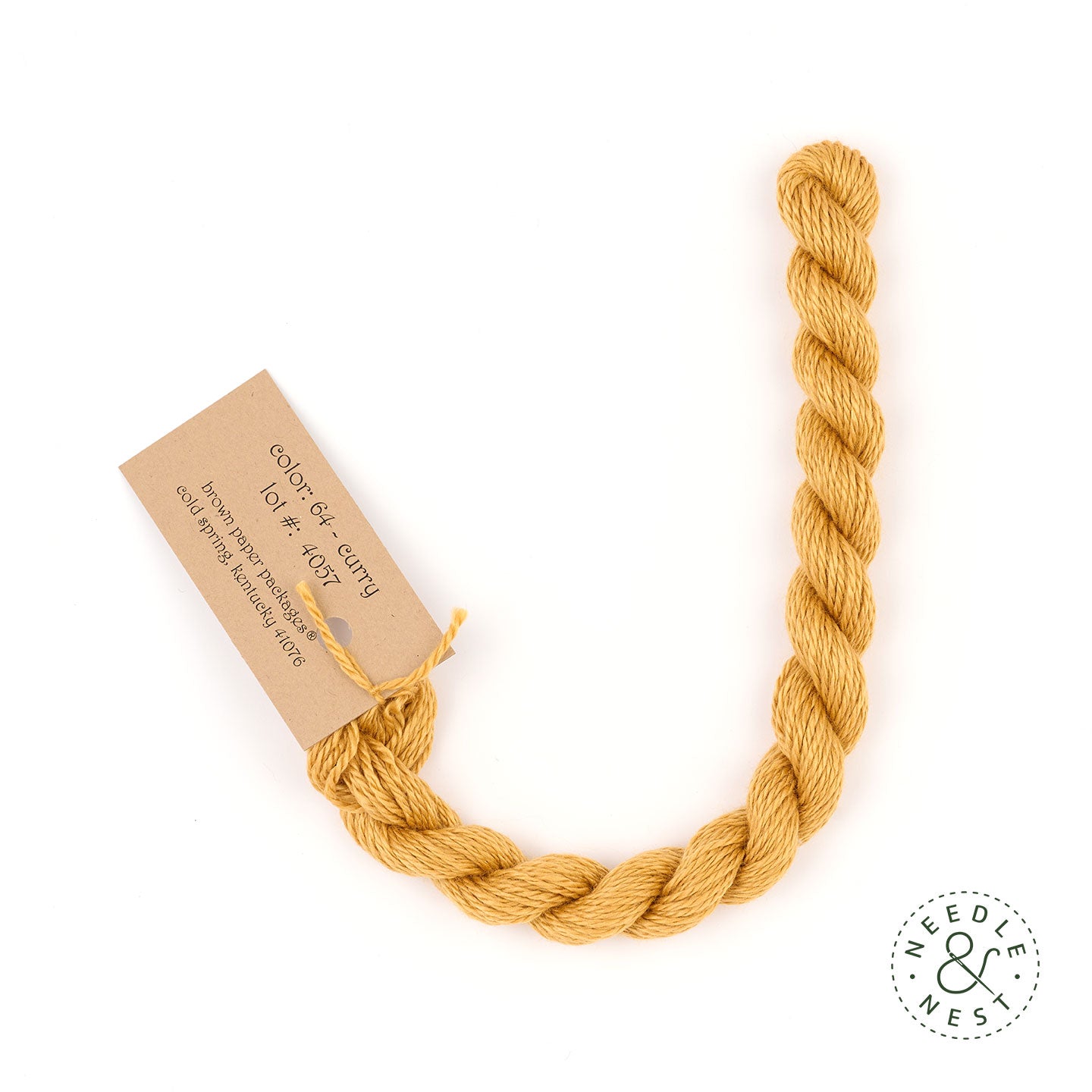 Silk & Ivory Curry Thread on a White Background
