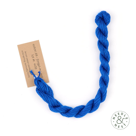 Silk & Ivory Forget-me-not Thread on a White Background