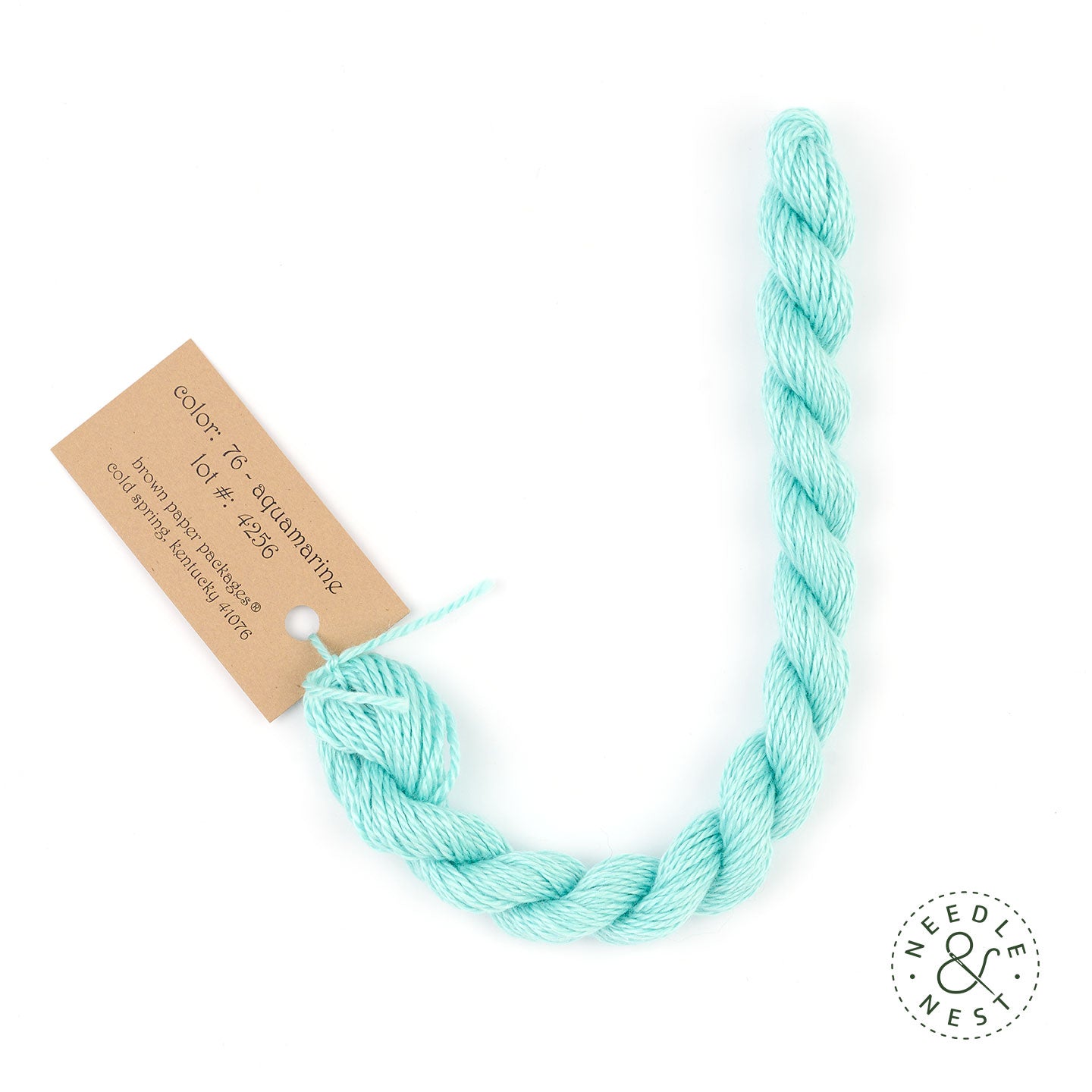 Silk & Ivory Aquamarine Thread on a White Background