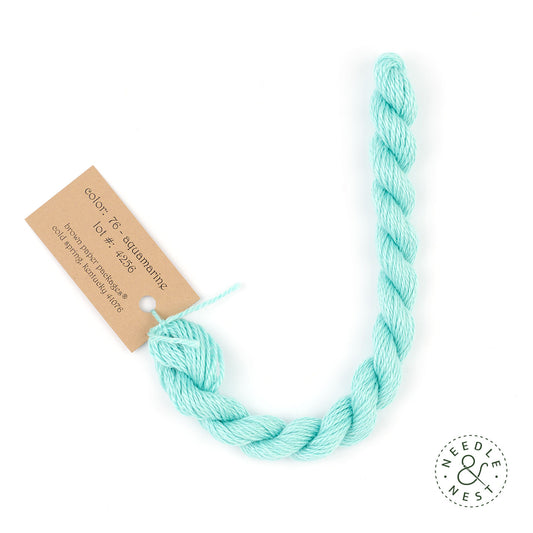 Silk & Ivory Aquamarine Thread on a White Background
