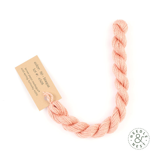 Silk & Ivory Bisque Thread on a White Background