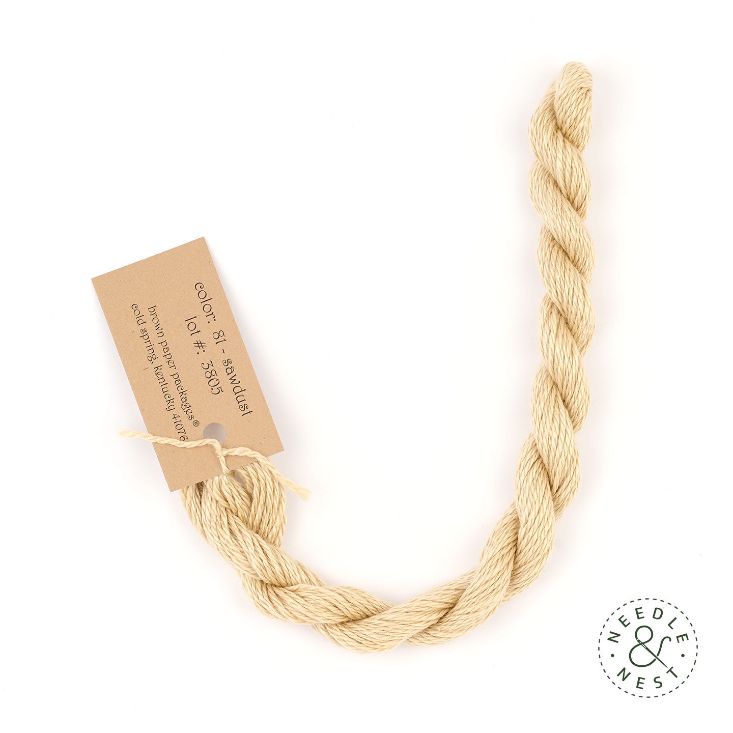 Silk & Ivory Sawdust Thread on a White Background