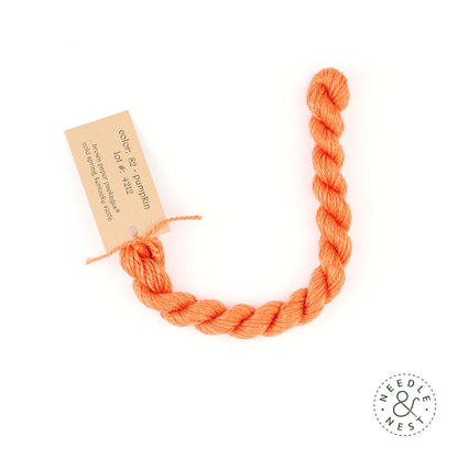 Silk & Ivory Pumpkin Thread on a White Background