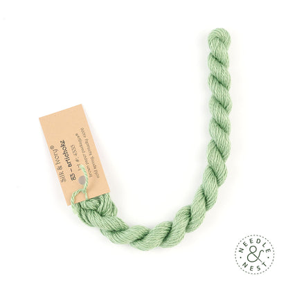 Silk & Ivory Artichoke Thread on a White Background