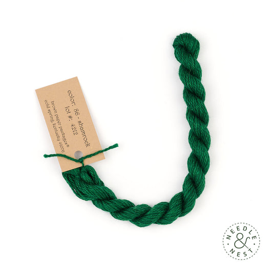 Silk & Ivory Shamrock Thread on a White Background