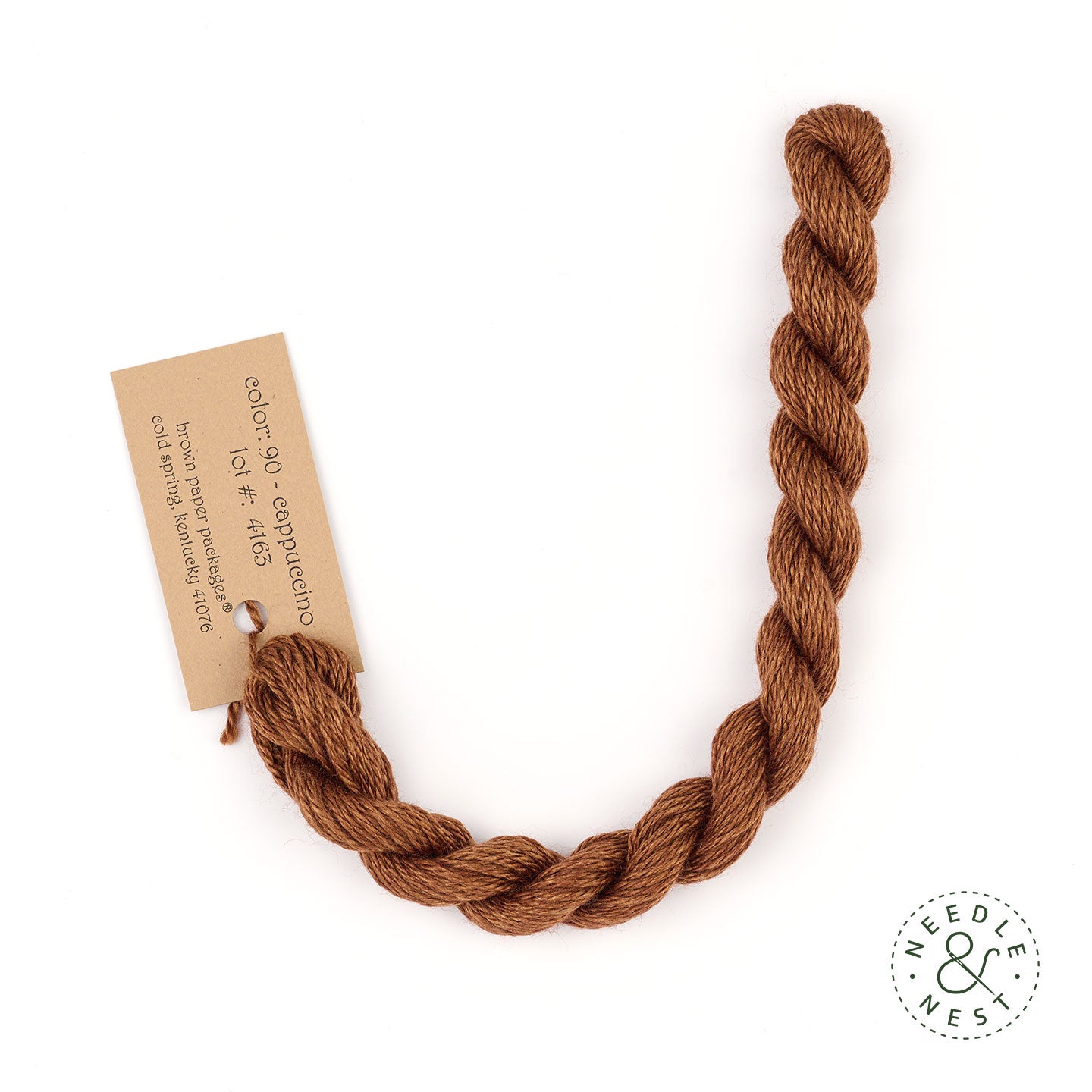 Silk & Ivory Cappuccino Thread on a White Background