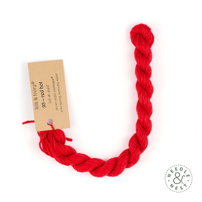 Silk & Ivory Red Hot Thread on a White Background