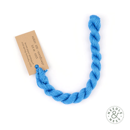 Silk & Ivory Cornflower Thread on a White Background