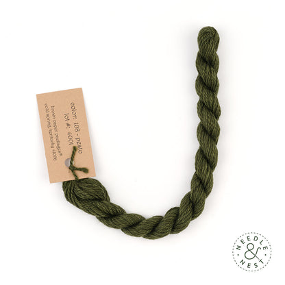 Silk & Ivory Pesto Thread on a White Background