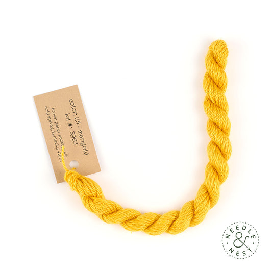 Silk & Ivory Marigold Thread on a White Background