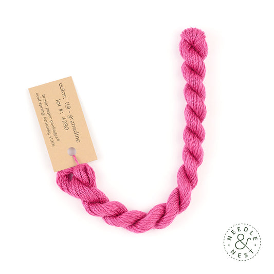 Silk & Ivory Grenadine Thread on a White Background