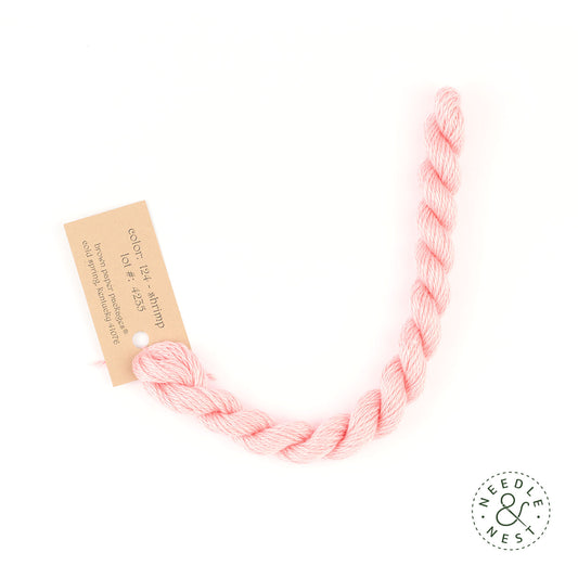 Silk & Ivory Shrimp Thread on a White Background