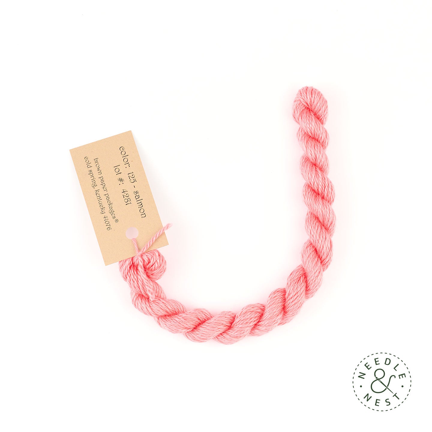 Silk & Ivory Salmon Thread on a White Background