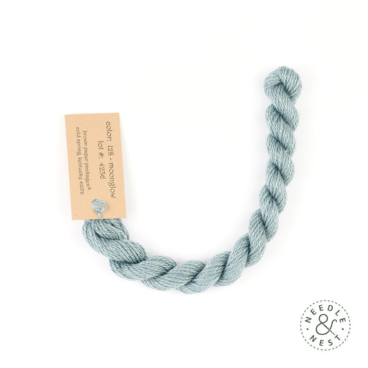 Silk & Ivory Moonglow Thread on a White Background