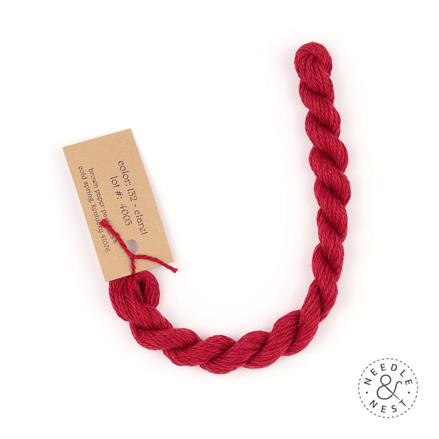 Silk & Ivory Claret Thread on a White Background