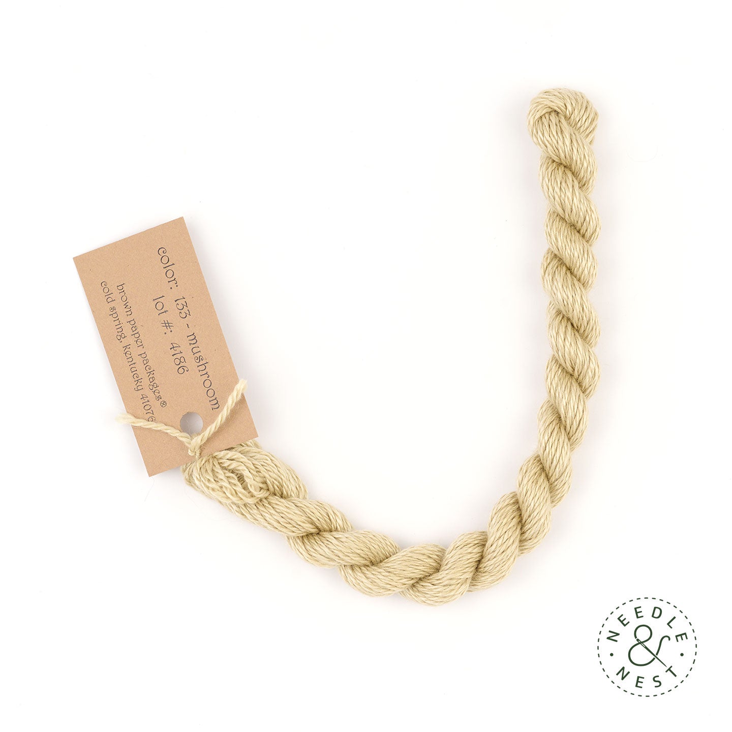 Silk & Ivory Mushroom Thread on a White Background