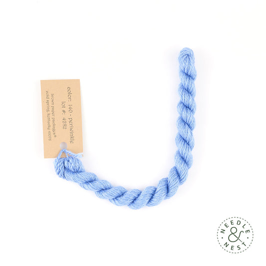 Silk & Ivory Periwinkle Thread on a White Background