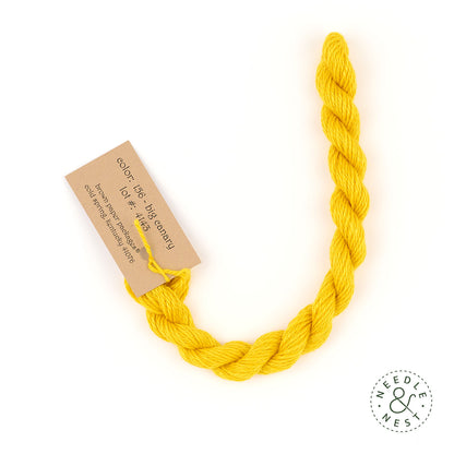 Silk & Ivory Big Canary Thread on a White Background