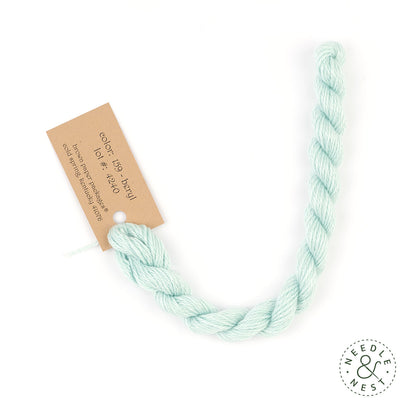 Silk & Ivory Beryl Thread on a White Background