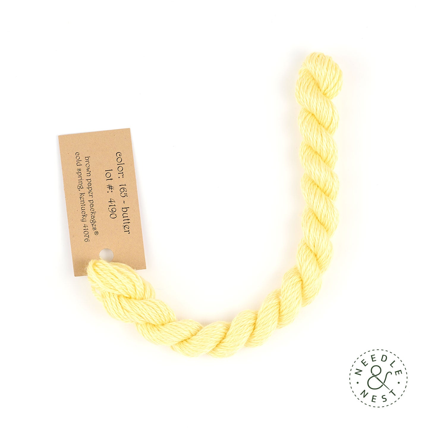 Silk & Ivory Butter Thread on a White Background