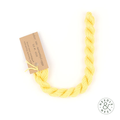 Silk & Ivory Scrambled Eggs Thread on a White Background