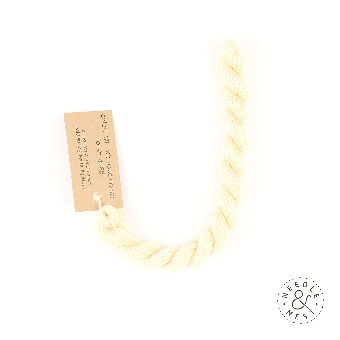 Silk & Ivory Whipped Cream Thread on a White Background